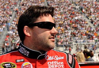 BRISTOL, TN - MARCH 22:  Tony Stewart, driver of the #14 Office Depot/Old Spice Chevrolet, stands on the grid prior to the start of the NASCAR Sprint Cup Series Food City 500 at Bristol Motor Speedway on March 22, 2009 in Bristol, Tennessee.  (Photo by Rusty Jarrett/Getty Images for NASCAR)