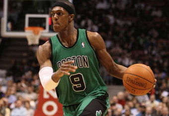 EAST RUTHERFORD, NJ - MARCH 04:  Rajon Rondo #9 of Boston Celtics dribbles the ball against the New Jersey Nets during their game on March 4th, 2009 at The Izod Center in East Rutherford, New Jersey.  NOTE TO USER: User expressly acknowledges and agrees that, by downloading and/or using this Photograph, user is consenting to the terms and conditions of the Getty Images License Agreement. Photo By Al Bello/Getty Images  (Photo by Al Bello/Getty Images)