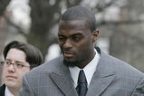 LEBANON - JANUARY 14: New York Giants wide receiver Plaxico Burress winks at a supporter as he arrives at the Lebanon County Courthouse January 14, 2009 in Lebanon, Pa.  Burress is scheduled to appear in a civil trial in a dispute with an automobile dealer over what he owes in damages to a vehicle supplied to him by the dealership. (Photo by Chris Gardner/Getty Images)