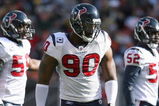 CLEVELAND - NOVEMBER 23:  Mario Williams #90  of the Houston Texans walks on the field during the NFL game against the Cleveland Browns at Cleveland Browns Stadium on November 23, 2008 in Cleveland, Ohio.  (Photo by Andy Lyons/Getty Images)