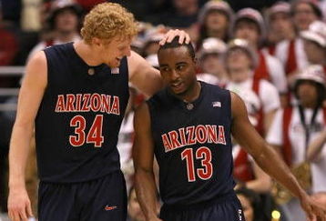 LOS ANGELES, CA - MARCH 13:  Nic Wise #13 of the Arizona Wildcats is congratulated by teammates Chase Budinger #34 during the 2008 Pacific Life Pac-10 Men's Basketball Tournament Day Two against the Stanford Cardinal at Staples Center on March 13, 2008 in Los Angeles, California.  (Photo by Stephen Dunn/Getty Images)