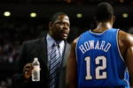 AUBURN HILLS, MI - MAY 13:  Assistant coach Patrick Ewing of the Orlando Magic talks with Dwight Howard #12 against the Detroit Pistons in Game Five of the Eastern Conference Semifinals during the 2008 NBA Playoffs at the Palace of Auburn Hills in Auburn Hills, Michigan.  NOTE TO USER: User expressly acknowledges and agrees that, by downloading and or using this photograph, User is consenting to the terms and conditions of the Getty Images License Agreement.  (Photo by Gregory Shamus/Getty Images)
