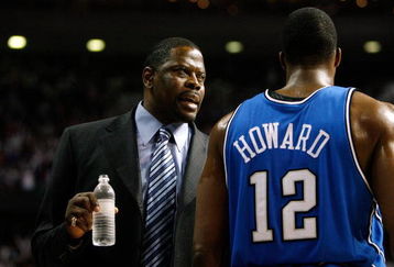 AUBURN HILLS, MI - MAY 13:  Assistant coach Patrick Ewing of the Orlando Magic talks with Dwight Howard #12 against the Detroit Pistons in Game Five of the Eastern Conference Semifinals during the 2008 NBA Playoffs at the Palace of Auburn Hills in Auburn Hills, Michigan.  NOTE TO USER: User expressly acknowledges and agrees that, by downloading and or using this photograph, User is consenting to the terms and conditions of the Getty Images License Agreement.  (Photo by Gregory Shamus/Getty Images)