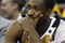CLEVELAND - APRIL 21:  Gilbert Arenas #0 of the Washington Wizards looks on from the bench late in the game while playing the Cleveland Cavaliers in Game Two of the Eastern Conference Quarterfinals during the 2008 NBA Playoffs at Quicken Loans Arena April 21, 2008 in Cleveland, Ohio. Cleveland won the game 116-86. NOTE TO USER: User expressly acknowledges and agrees that, by downloading and or using this photograph, User is consenting to the terms and conditions of the Getty Images License Agreement.  (Photo by Gregory Shamus/Getty Images)