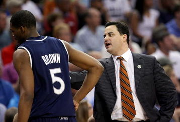 PHOENIX - MARCH 29:  Head coach Sean Miller of the Xavier Musketeers talks to Derrick Brown #5 during the second half against the UCLA Bruins in the West Regional Final at the U.S. Airways Center on March 29, 2008 in Phoenix, Arizona.  (Photo by Stephen Dunn/Getty Images)