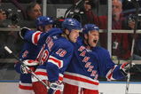 NEW YORK - MARCH 15: Sean Avery #16 (R) of the New York Rangers celebrates his second goal of the game against the Philadelphia Flyers and is joined by Dan Girardi #5 (L) and Marc Staal #18 (C) on March 15, 2009 at Madison Square Garden in New York City. The Rangers defetaed the Flyers 4-1. (Photo by Bruce Bennett/Getty Images)