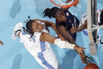 CHAPEL HILL, NC - JANUARY 19:  Tina Charles #31 of the Connecticut Huskies moves for the rebound against Chay Shegog #20 of the North Carolina Tar Heels during the game on January 19, 2009 at the Dean E. Smith Center in Chapel Hill, North Carolina.  (Photo by Kevin C. Cox/Getty Images)