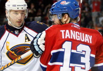 MONTREAL- DECEMBER 2:  Ilya Kovalchuk #17 of the Atlanta Thrashers pushes Alex Tanguay #13 of the Montreal Canadiens during the game at the Bell Centre on December 02, 2008 in Montreal, Quebec, Canada.  The Canadiens defeated the Thrashers 5-4.  (Photo by Richard Wolowicz/Getty Images)