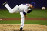 NEW YORK - SEPTEMBER 26:  Mike Pelfrey #34 of the New York Mets delivers a pitch against the Florida Marlins on September 26, 2008 at Shea Stadium in the Flushing neighborhood of the Queens borough of New York City.  (Photo by Jim McIsaac/Getty Images)