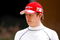 SAKHIR, BAHRAIN - FEBRUARY 17:  Kimi Raikkonen of Finland and Ferrari walks to the team garage during Formula One testing ahead of the 2009 Formula One season at the Bahrain International Circuit on February 17, 2009 in Sakhir, Bahrain.  (Photo by Paul Gilham/Getty Images)