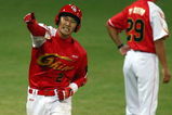 BEIJING - AUGUST 18:  Yang Yang #2 of China celebrates after hitting a home run against the United States at the Wukesong Baseball Field on Day 10 of the Beijing 2008 Olympic Games on August 18, 2008 in Beijing, China.  (Photo by Clive Rose/Getty Images)