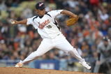 LOS ANGELES, CA - MARCH 22:  Starting pitcher Daisuke Matsuzaka #18 of Japan delivers a pitch against the United States in the semifinal game of the 2009 World Baseball Classic against the United States on March 22, 2009 at Dodger Stadium in Los Angeles, California. Japan defeated the United States 9-4.  (Photo by Stephen Dunn/Getty Images)