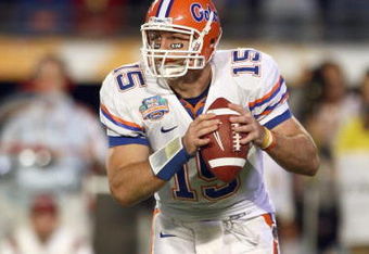 MIAMI - JANUARY 08:  Quarterback Tim Tebow #15 of the Florida Gators moves to pass the ball during the FedEx BCS National Championship Game against the Oklahoma Sooners at Dolphin Stadium on January 8, 2009 in Miami, Florida.  (Photo by Donald Miralle/Getty Images)