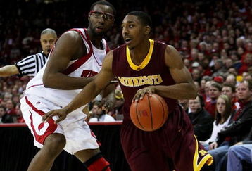 MADISON, WI - JANUARY 15: Al Nolen #0 of the Minnesota Golden Gophers drvies around Marcus Landry #1 of the Wisconsin Badgers on January 15, 2009 at the Kohl Center in Madison, Wisconsin. Minnesota defeated Wisconsin 78-74 in overtime. (Photo by Jonathan Daniel/Getty Images)