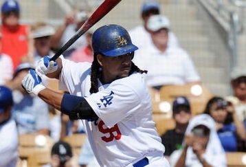 GLENDALE, AZ - MARCH 13:   Manny Ramirez #99 of the Los Angeles Dodgers at bat during a Spring Training game against the Texas Rangers on March 13, 2009 at Camelback Ranch in Glendale, Arizona.  (Photo by Lisa Blumenfeld/Getty Images)