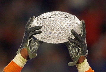 MIAMI - JANUARY 08:  Brandon Spikes #51 of the Florida Gators holds up the winning trophy after the FedEx BCS National Championship Game against the Oklahoma Sooners at Dolphin Stadium on January 8, 2009 in Miami, Florida.  (Photo by Eliot J. Schechter/Getty Images)