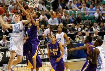 GREENSBORO, NC - MARCH 21:  Tyler Hansbrough #50 of the North Carolina Tar Heels shoots against Chris Johnson #21 of the Louisiana State University Tigers during the second round of the NCAA Division I Men's Basketball Tournament at the Greensboro Coliseum on March 21, 2009 in Greensboro, North Carolina.  (Photo by Streeter Lecka/Getty Images)