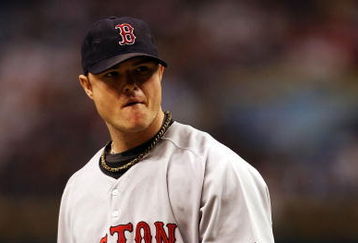 ST PETERSBURG, FL - OCTOBER 19:  Starting pitcher Jon Lester #31 of the Boston Red Sox walks off of the field against the Tampa Bay Rays in game seven of the American League Championship Series during the 2008 MLB playoffs on October 19, 2008 at Tropicana Field in St Petersburg, Florida.  (Photo by Elsa/Getty Images)