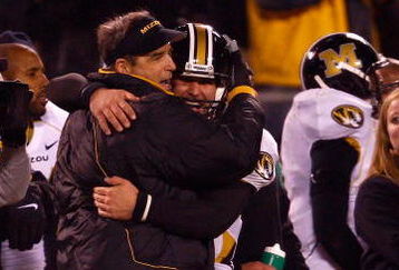 KANSAS CITY, MO - NOVEMBER 24:  Head coach Gary Pinkel of the Missouri Tigers celebrates with quarterback Chase Daniel #10 as the final seconds tick off the clock during the 2nd half of the game against the Kansas Jayhawks at Arrowhead Stadium November 24, 2007 in Kansas City, Missouri.  (Photo by Jamie Squire/Getty Images)