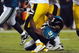 JACKSONVILLE, FL - OCTOBER 05: Quarterback Ben Roethlisberger #7 of the Pittsburgh Steelers is sacked by Derrick Harvey #91 of the Jacksonville Jaguars at Jacksonville Municipal Stadium on October 5, 2008 in Jacksonville, Florida. (Photo by Sam Greenwood/Getty Images)
