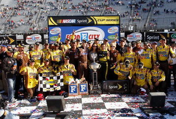 BRISTOL, TN - MARCH 22:  Kyle Busch Driver of the #18 Snickers Toyota celebrates in Victory Lane with his crew after winning the NASCAR Sprint Cup Series Food City 500 at Bristol Motor Speedway on March 22, 2009 in Bristol, Tennessee.  (Photo by John Harrelson/Getty Images)