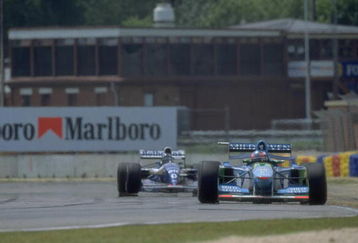 13 Nov 1994:  Benetton Ford driver Michael Schumacher of Germany leads from Williams Renault driver Damon Hill of Great Britain during the Australian Grand Prix at the Adelaide circuit in Australia. Hill and Schumacher both retired from the race after colliding with each other. \ Mandatory Credit: Pascal  Rondeau/Allsport