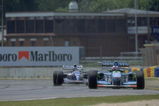 13 Nov 1994:  Benetton Ford driver Michael Schumacher of Germany leads from Williams Renault driver Damon Hill of Great Britain during the Australian Grand Prix at the Adelaide circuit in Australia. Hill and Schumacher both retired from the race after colliding with each other. \ Mandatory Credit: Pascal  Rondeau/Allsport