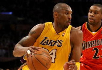 LOS ANGELES - MARCH 19: Kobe Bryant #24 of the Los Angeles Lakers drives around C.J. Watson #23 of the Golden State Warriors on March 19, 2009 at Staples Center in Los Angeles, California. NOTE TO USER: User expressly acknowledges and agrees that, by downloading and/or using this Photograph, user is consenting to the terms and conditions of the Getty Images License Agreement. (Photo by Stephen Dunn/Getty Images)