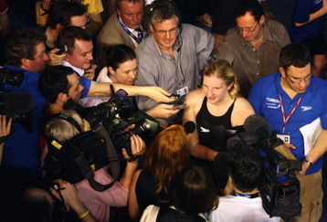 SHEFFIELD, UNITED KINGDOM - MARCH 19:  Rebecca Adlington is surrounded by the media after winning the Women's Open 800m Freestyle Final on day four of the British Gas Swimming Championships at Ponds Forge on March 19, 2009 in Sheffield, England  (Photo by Clive Rose/Getty Images)