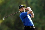 PALM HARBOR, FL - MARCH 22:  Retief Goosen of South Africa plays a shot on the 17th hole during the final round of the Transitions Championship at the Innisbrook Resort and Golf Club on March 22, 2009 in Palm Harbor, Florida.  (Photo by Sam Greenwood/Getty Images)