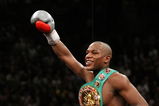 LAS VEGAS - DECEMBER 08:  Floyd Mayweather Jr. celebrates his 10th round knockout of Ricky Hatton of England after their WBC world welterweight championship fight at the MGM Grand Garden Arena on December 8, 2007 in Las Vegas, Nevada.  (Photo by Al Bello/Getty Images)
