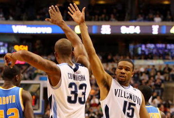 PHILADELPHIA - MARCH 21:  Dante Cunningham #33 and Reggie Redding #15 of the Villanova Wildcats celebrate during the game against the UCLA Bruins during the second round of the NCAA Division I Men's Basketball Tournament at the Wachovia Center on March 21, 2009 in Philadelphia, Pennsylvania. The Wildcats defeated the Bruins 89-69. (Photo by Jim McIsaac/Getty Images)