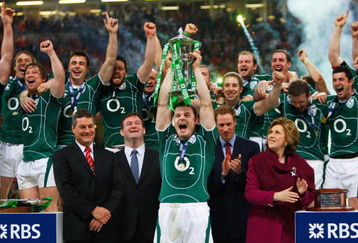 CARDIFF, UNITED KINGDOM - MARCH 21:  Brian O'Driscoll of Ireland lifts the trophy after Ireland won the Grand Slam as Prince William looks on during the RBS 6 Nations Championship match between Wales and Ireland at the Millennium Stadium on March 21, 2009 in Cardiff, Wales.  (Photo by Stu Forster/Getty Images)