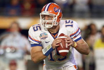 MIAMI - JANUARY 08:  Quarterback Tim Tebow #15 of the Florida Gators moves to pass the ball during the FedEx BCS National Championship Game against the Oklahoma Sooners at Dolphin Stadium on January 8, 2009 in Miami, Florida.  (Photo by Donald Miralle/Getty Images)