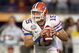 MIAMI - JANUARY 08: Quarterback Tim Tebow #15 of the Florida Gators moves to pass the ball during the FedEx BCS National Championship Game against the Oklahoma Sooners at Dolphin Stadium on January 8, 2009 in Miami, Florida. (Photo by Donald Miralle/Getty Images)