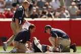 FOXBORO, MA - SEPTEMBER 7:  Quarterback Tom Brady #12 of the New England Patriots is assesed by the medical staff after he sustained an injury to his left knee in the first quarter against the Kansas City Chiefs at Gillette Stadium September 7, 2008 in Foxboro, Massachusetts.  (Photo by Elsa/Getty Images)