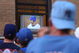 CHICAGO - OCTOBER 6:  Chicago Cubs fans watch the game on a television propped in an apartment window across the street from Wrigley Field as the Chicago Cubs play the Arizona Diamondbacks in the National League Division Series October 6, 2007 in Chicago, Illinois. The Cubs, who have not won a World Series in 99 years, were swept in three straight games by the Diamondbacks.  (Photo by Scott Olson/Getty Images)