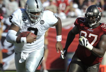 TAMPA, FL - DECEMBER 28: Quarterback JaMarcus Russell #2 of the Oakland Raiders scrambles from the pocket against the Tampa Bay Buccaneers at Raymond James Stadium on December 28, 2008 in Tampa, Florida.  (Photo by Al Messerschmidt/Getty Images)