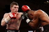 LAS VEGAS - JANUARY 20:  Ricky Hatton (L) of England throws a left to the head of Juan Urango of Colombia as he ducks down during their junior welterweight title fight on January 20, 2007 in the Paris Ballroom at the Paris Hotel in Las Vegas, Nevada.  (Photo by John Gichigi/Getty Images)