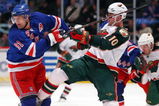 NEW YORK - MARCH 24:  Markus Naslund #91 of the New York Rangers skates against Marian Gaborik #10 of the Minnesota Wild on March 24, 2009 at Madison Square Garden in New York City. The Rangers defeated the Wild 3-2.  (Photo by Jim McIsaac/Getty Images)