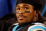 CHARLOTTE, NC - JANUARY 10:  DeAngelo Williams #34 of the Carolina Panthers look on from the bench in the fourth quarter of the game against the Arizona Cardinals during the NFC Divisional Playoff Game on January 10, 2009 at Bank of America Stadium in Charlotte, North Carolina.  The Arizona Cardinals defeated the Carolina Panthers with a score of 33-13. (Photo by Streeter Lecka/Getty Images)
