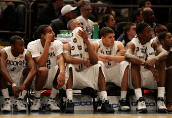 NEW YORK - MARCH 12:  The Connecticut Huskies bench looks on towards the end of the game against the Syracuse Orange during the quarterfinal round of the Big East Tournament at Madison Square Garden on March 12, 2009 in New York City.  (Photo by Michael Heiman/Getty Images)