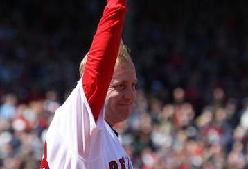 BOSTON - APRIL 08:  Curt Schilling #38 of the Boston Red Sox  heads out on to the field to get his 2007 World Series Championship Ring before the game the Detroit Tigers on April 8,2008 during Opening Day at Fenway Park in Boston, Massachusetts.  (Photo by Elsa/Getty Images)
