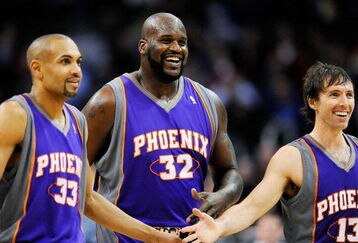 LOS ANGELES, CA - FEBRUARY 18:  Shaquille O'Neal #32 of the Phoenix Suns is congratualted by his teammate Steve Nash #13 and Grant Hill #33 during the basketball game against the Los Angeles Clippers during the second quarter at the Staples Center on February 18, 2009 in Los Angeles, California. NOTE TO USER: User expressly acknowledges and agrees that, by downloading and or using this photograph, User is consenting to the terms and conditions of the Getty Images License Agreement.  (Photo by Kevork Djansezian/Getty Images)