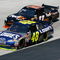 BRISTOL, TN - MARCH 22:  Denny Hamlin, driver of the #11 FedEx Express Toyota, races Jimmie Johnson, driver of the #48 Lowe's Chevrolet, side by side during the NASCAR Sprint Cup Series Food City 500 at Bristol Motor Speedway on March 22, 2009 in Bristol, Tennessee.  (Photo by Geoff Burke/Getty Images for NASCAR)