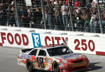 BRISTOL, TN - MARCH 22:  Kyle Busch, driver of the #18 Snickers Toyota, celebrates winning the NASCAR Sprint Cup Series Food City 500 at Bristol Motor Speedway on March 22, 2009 in Bristol, Tennessee.  (Photo by Jerry Markland/Getty Images for NASCAR)