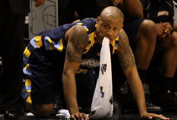BOISE, ID - MARCH 22:  Guard Dominic James #1 of the Marquette Golden Eagles looks on from the sidelines during their 83-79 loss to the Missouri Tigers during the second round of the NCAA Division I Men's Basketball Tournament at the Taco Bell Arena on March 22, 2009 in Boise, Idaho.  (Photo by Jed Jacobsohn/Getty Images)