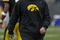 IOWA CITY, IOWA - NOVEMBER 8: Head Coach Kirk Ferentz of the Iowa Hawkeyes runs his team through warm up drills before taking on the  Penn State Nittany Lions at Kinnick Stadium on November 8, 2008 in Iowa City, Iowa. Iowa defeated Penn State  24-23. (Photo by David Purdy/Getty Images)