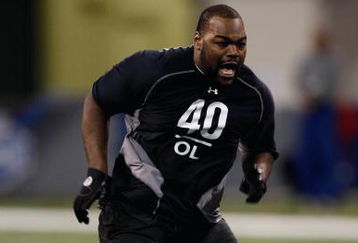 INDIANAPOLIS, IN - FEBRUARY 21:  Offensive lineman Michael Oher of Mississippi runs in practice drills during the NFL Scouting Combine presented by Under Armour at Lucas Oil Stadium on February 21, 2009 in Indianapolis, Indiana. (Photo by Scott Boehm/Getty Images)