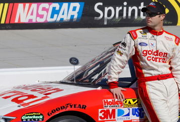 BRISTOL, TN - MARCH 20:  Travis Kvapil driver of the #28 Golden Corral Ford stands on pit road during qualifying for the NASCAR Sprint Cup Series Food City 500 at Bristol Motor Speedway on March 20, 2009 in Bristol, Tennessee.  (Photo by John Harrelson/Getty Images)
